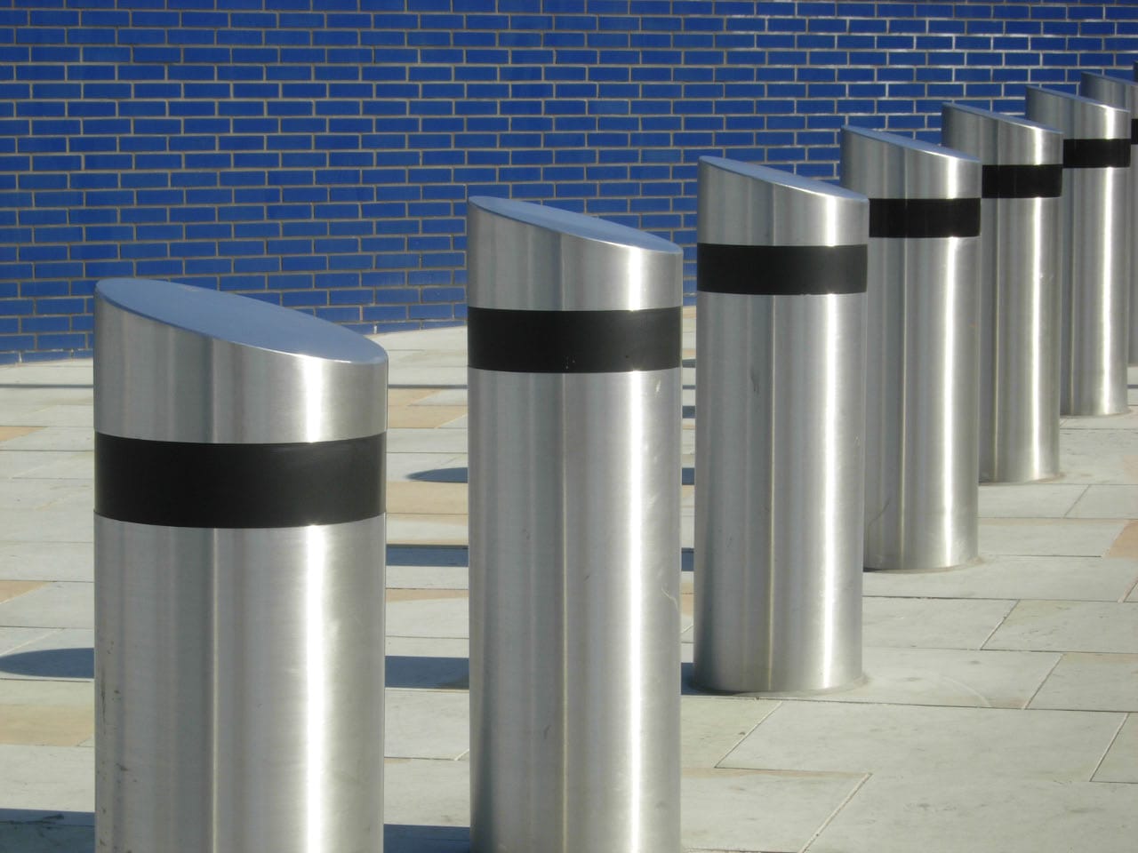 Neatly installed stainless steel city road bollards by Brooklynz metal works Singapore