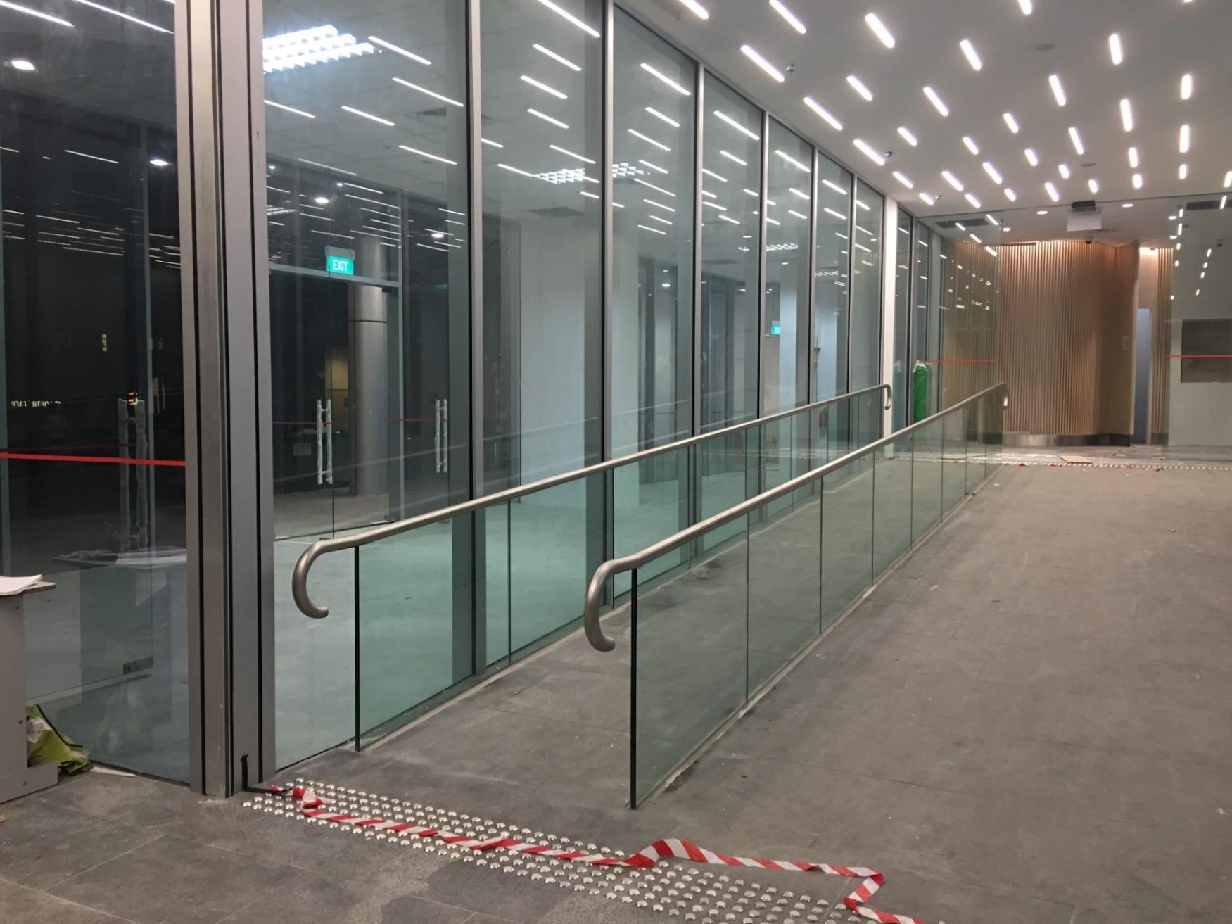 Customized and high quality glass railing of a business complex in Singapore
