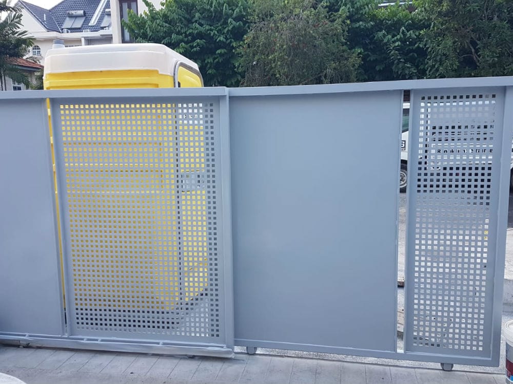 Exceptional quality mild steel gate in blue colour installed outside a residential building